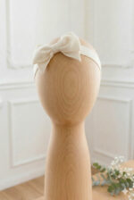 opaska w formie kokardy dla dziewczynki do chrztu